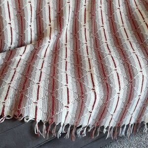 Vintage handmade 66" X 66" afghan  in beautiful southwestern colors.‎